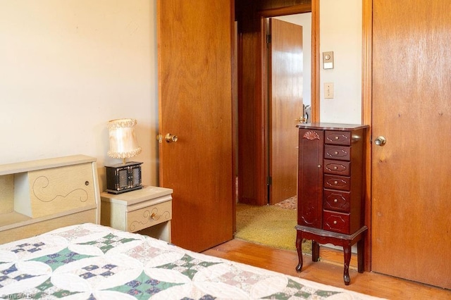 bedroom with wood finished floors