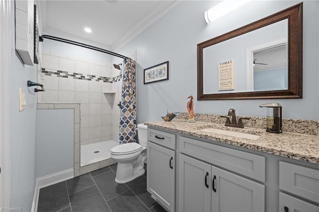 bathroom with vanity, a tile shower, tile patterned flooring, crown molding, and toilet