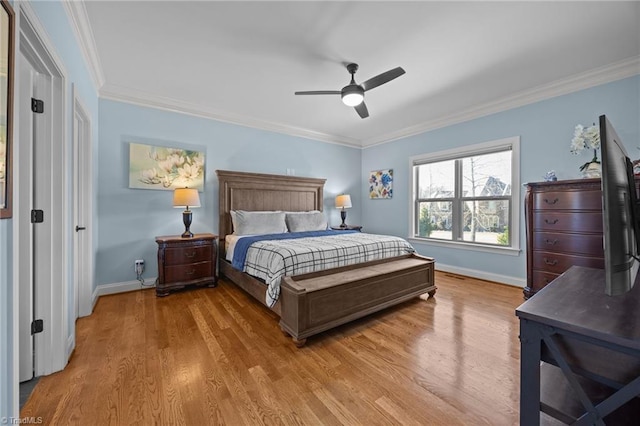 bedroom with ceiling fan, baseboards, light wood-style floors, and ornamental molding