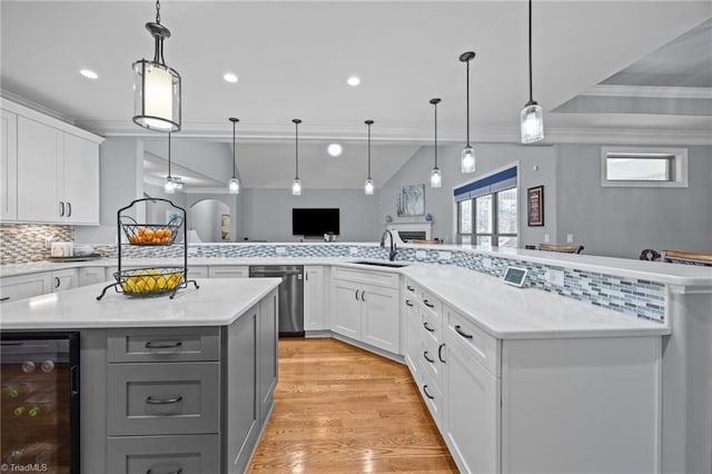 kitchen featuring a spacious island, gray cabinetry, wine cooler, decorative backsplash, and stainless steel dishwasher