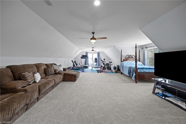 bedroom with vaulted ceiling, multiple windows, carpet flooring, and visible vents