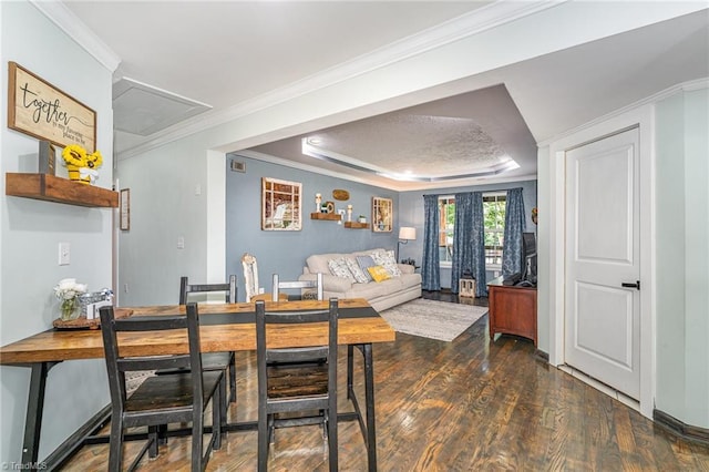 525 Carolina Blvd, Salisbury, NC 28146 - dining area featuring attic access, a tray ceiling, wood finished floors, and ornamental molding