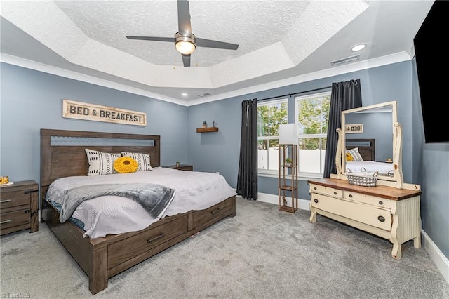 525 Carolina Blvd, Salisbury, NC 28146 - carpeted bedroom featuring a tray ceiling, a textured ceiling, and ceiling fan