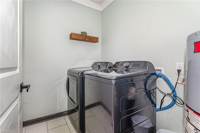 525 Carolina Blvd, Salisbury, NC 28146 - washroom featuring independent washer and dryer, light marble finish floors, and water heater