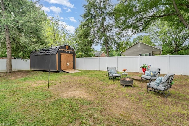 525 Carolina Blvd, Salisbury, NC 28146 - fenced backyard featuring a shed and a fire pit