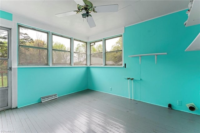 unfurnished sunroom with visible vents