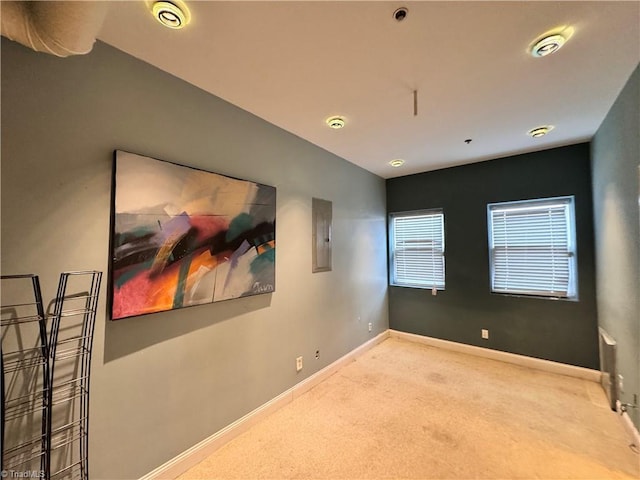 220 Market St Unit 110, Greensboro, NC 27401 - carpeted spare room with electric panel and baseboards