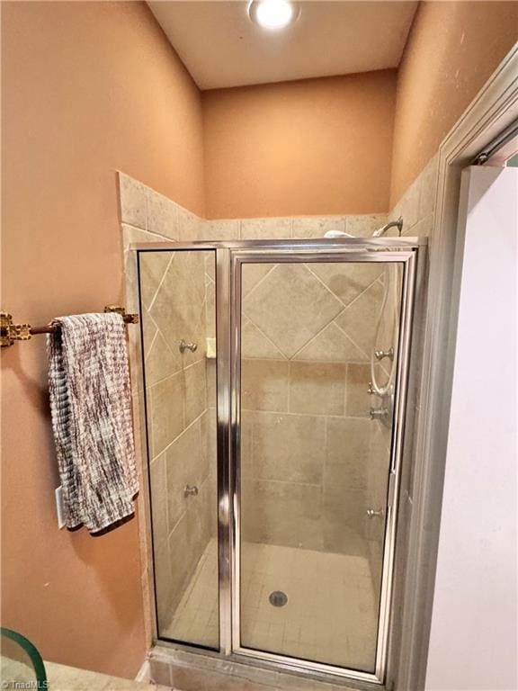 220 Market St Unit 110, Greensboro, NC 27401 - full bathroom featuring a shower stall