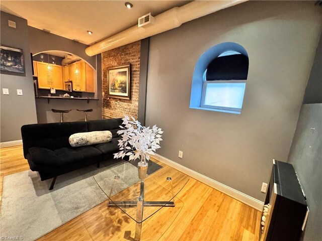 220 Market St Unit 110, Greensboro, NC 27401 - living area with wood finished floors and baseboards