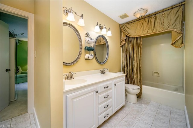 full bathroom featuring double sink, tile flooring, vanity with extensive cabinet space, toilet, and shower / tub combo