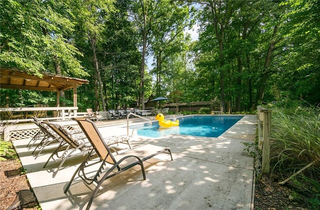 view of pool featuring a pergola and a patio area