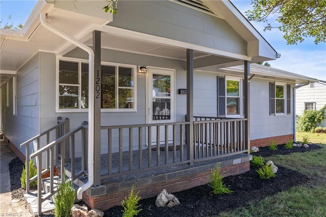 exterior space featuring covered porch