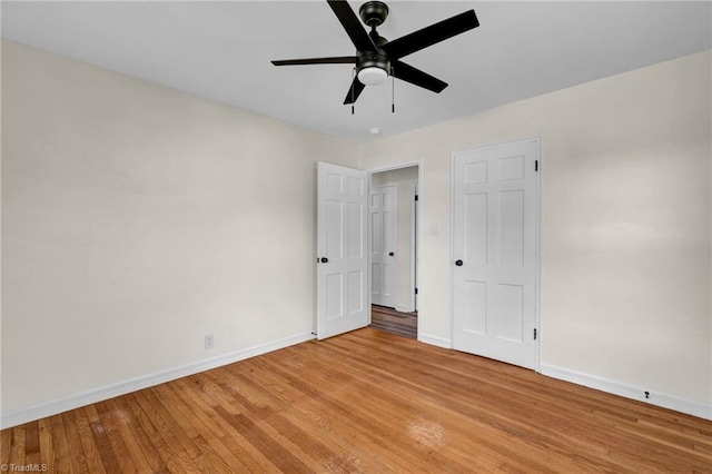 unfurnished bedroom with light hardwood / wood-style floors and ceiling fan