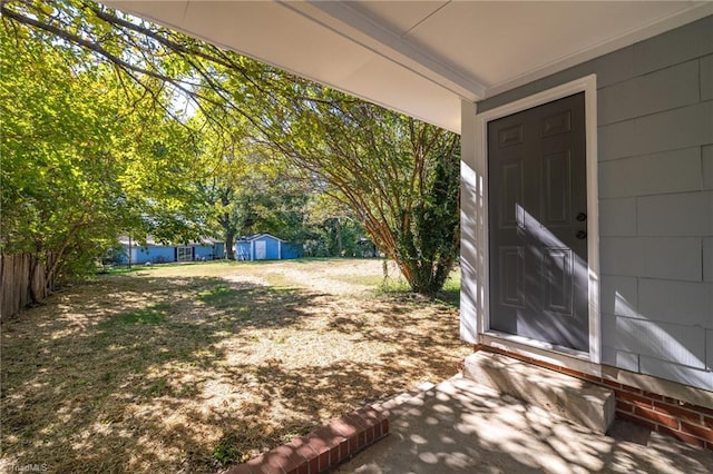 view of yard with a shed