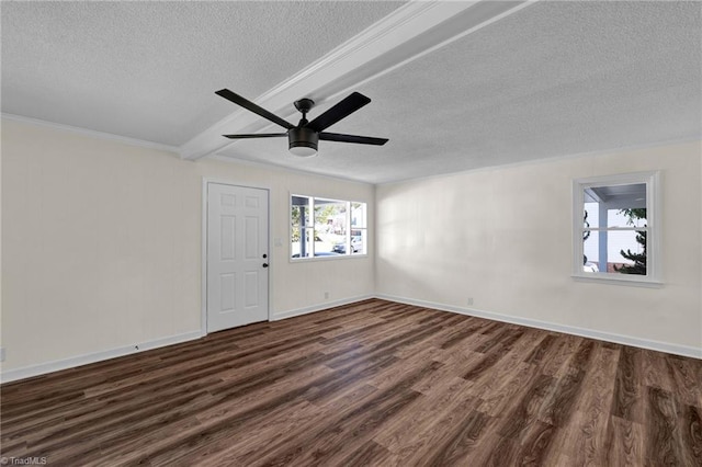 empty room with dark wood-type flooring, beam ceiling, a textured ceiling, and ceiling fan