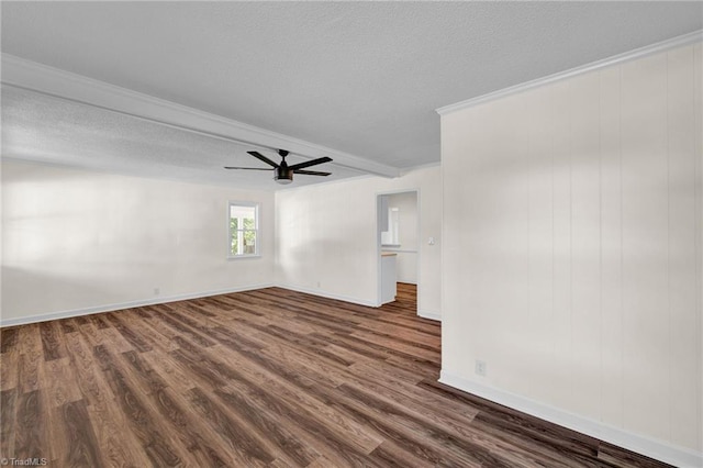 unfurnished room featuring dark wood-type flooring, ceiling fan, and a textured ceiling