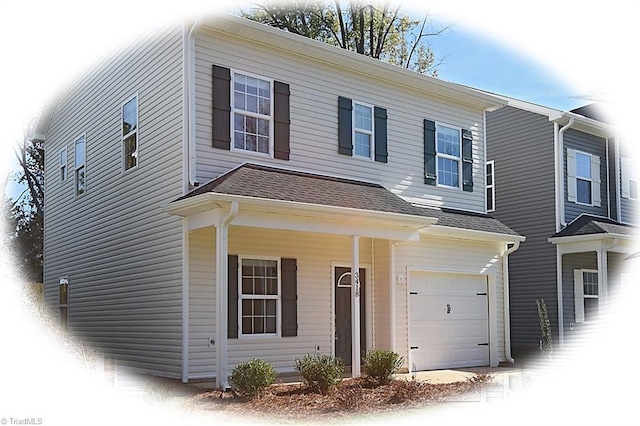 view of front of home with a garage
