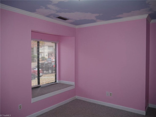 spare room with crown molding and carpet flooring