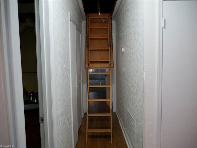 stairway with wood-type flooring