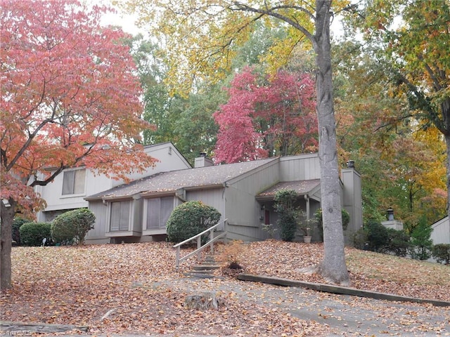 view of home's exterior with a chimney
