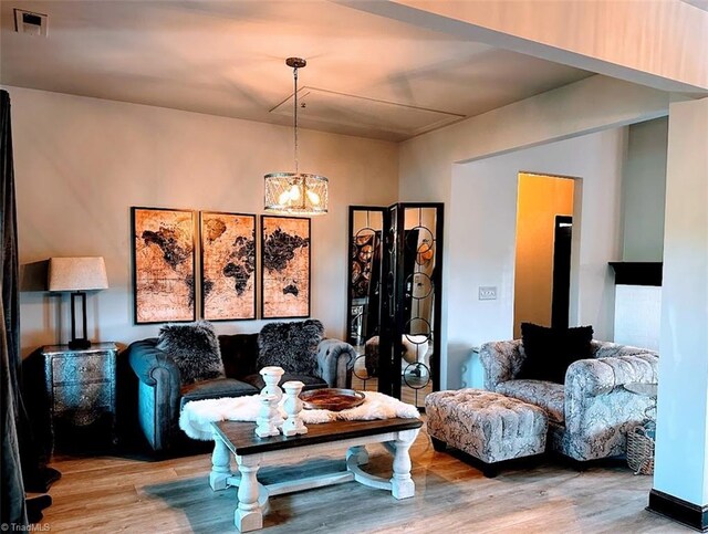 living room featuring ceiling fan, lofted ceiling, and hardwood / wood-style floors