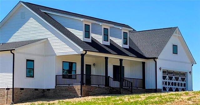 property entrance featuring covered porch