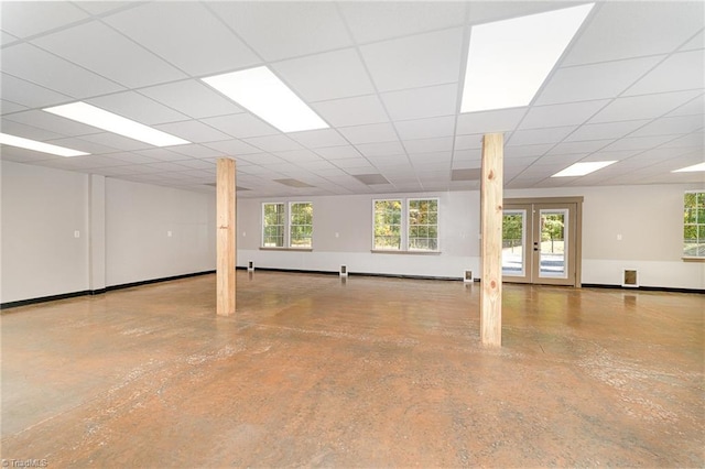 basement featuring a drop ceiling