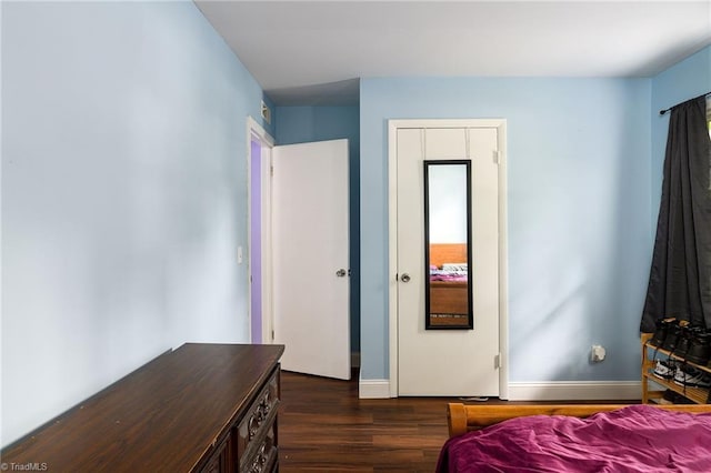1519 Graves Ave, High Point, NC 27260 - bedroom featuring dark wood-style floors and baseboards
