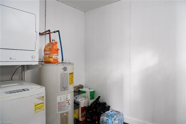 1519 Graves Ave, High Point, NC 27260 - laundry area featuring stacked washing machine and dryer and water heater