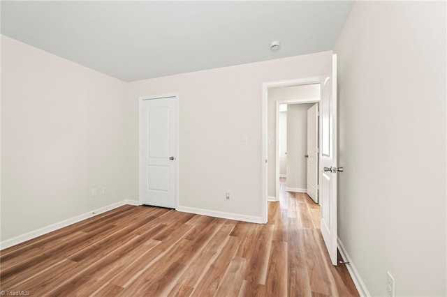 unfurnished bedroom featuring light hardwood / wood-style flooring