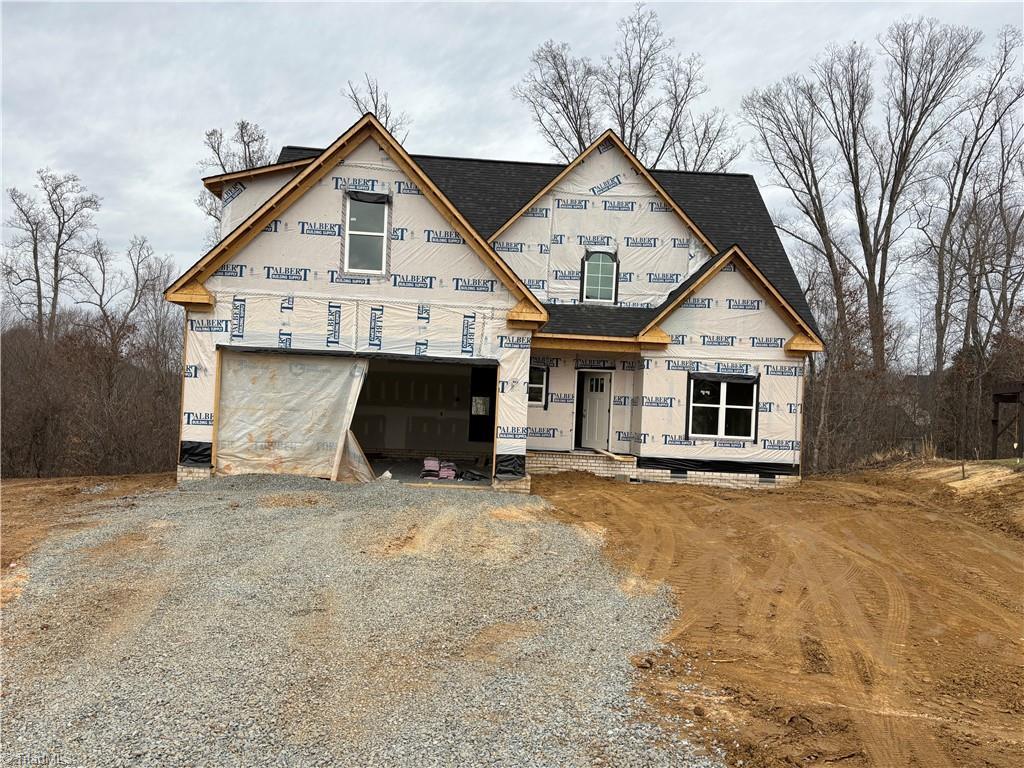 property under construction with a garage