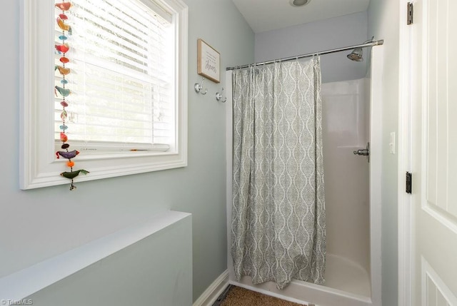bathroom featuring curtained shower