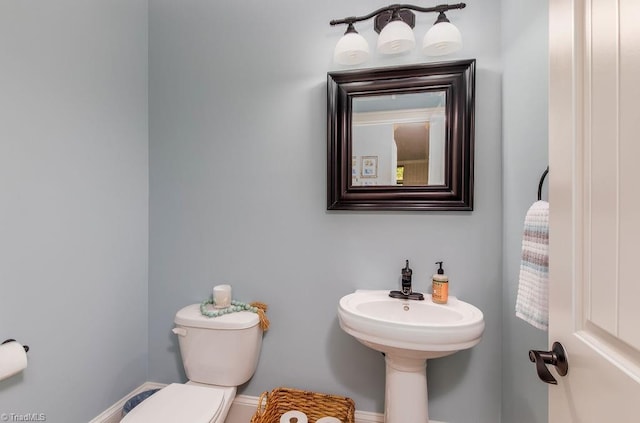 bathroom featuring toilet