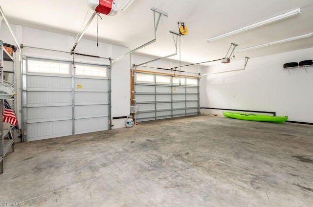 garage featuring a garage door opener