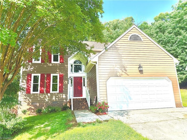 4803 Adams Ridge Dr, Greensboro, NC 27407 - view of front of property with concrete driveway, an attached garage, and a front yard