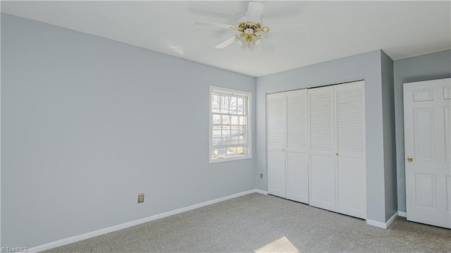 unfurnished bedroom with light carpet, a closet, and ceiling fan