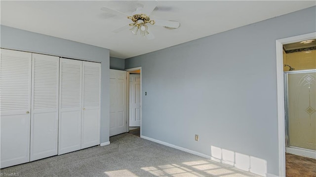 unfurnished bedroom with light carpet, a closet, and ceiling fan