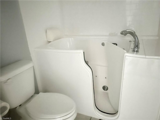 258 S Boyles St, Pilot Mountain, NC 27041 - bathroom with toilet and a tub to relax in
