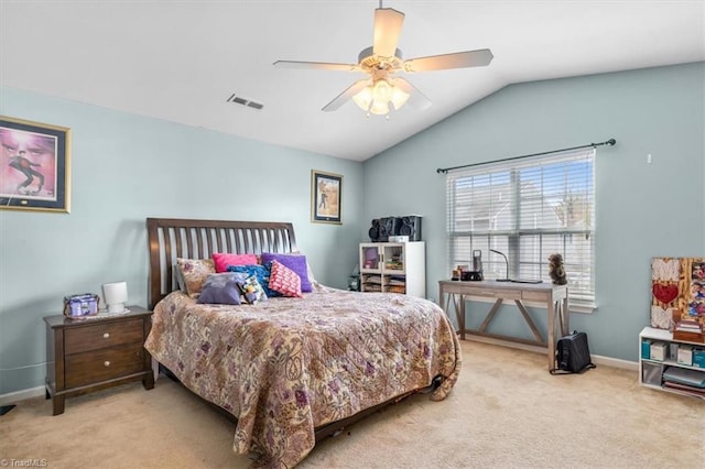 bedroom with ceiling fan, light colored carpet, and lofted ceiling