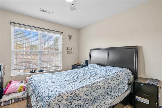 carpeted bedroom featuring ceiling fan