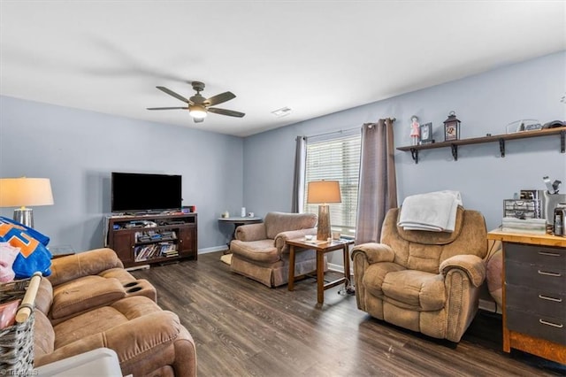 living room featuring ceiling fan and dark hardwood / wood-style flooring