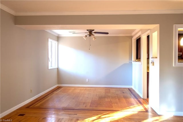 unfurnished room with ornamental molding, ceiling fan, and hardwood / wood-style flooring