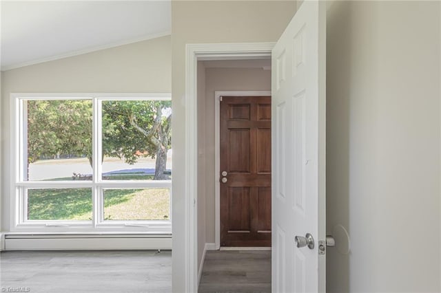 interior space featuring baseboard heating