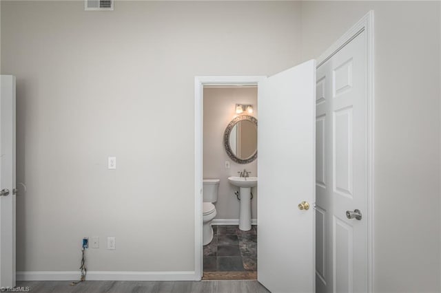 bathroom featuring toilet