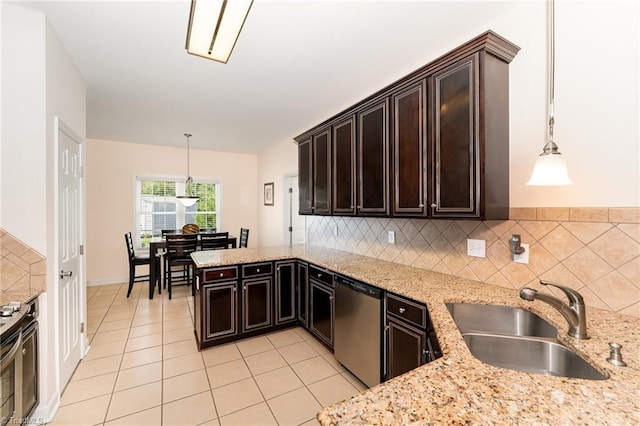 4060 Tarmac Dr, Sophia, NC 27350 - kitchen featuring stainless steel appliances, decorative backsplash, dark brown cabinets, pendant lighting, and a peninsula