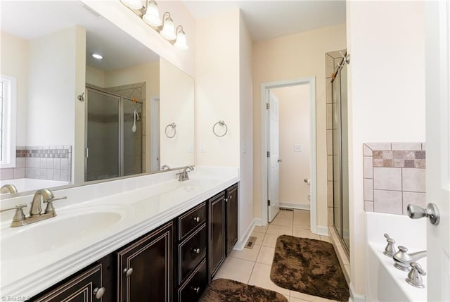4060 Tarmac Dr, Sophia, NC 27350 - full bathroom with tile patterned flooring, a shower stall, double vanity, and a bath