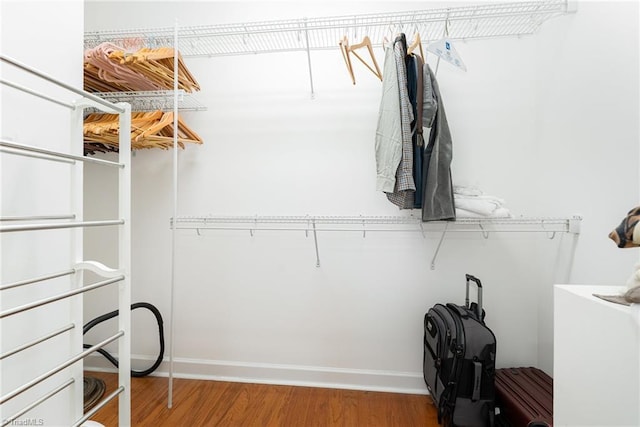 4060 Tarmac Dr, Sophia, NC 27350 - spacious closet featuring wood finished floors