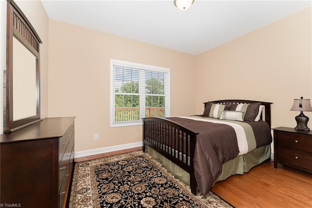 4060 Tarmac Dr, Sophia, NC 27350 - bedroom with baseboards and light wood-type flooring