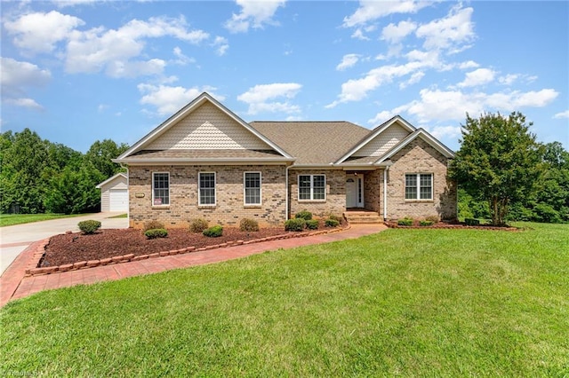 4060 Tarmac Dr, Sophia, NC 27350 - view of front facade featuring brick siding, a front yard, and a garage