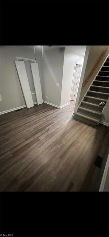 interior space featuring dark wood-type flooring